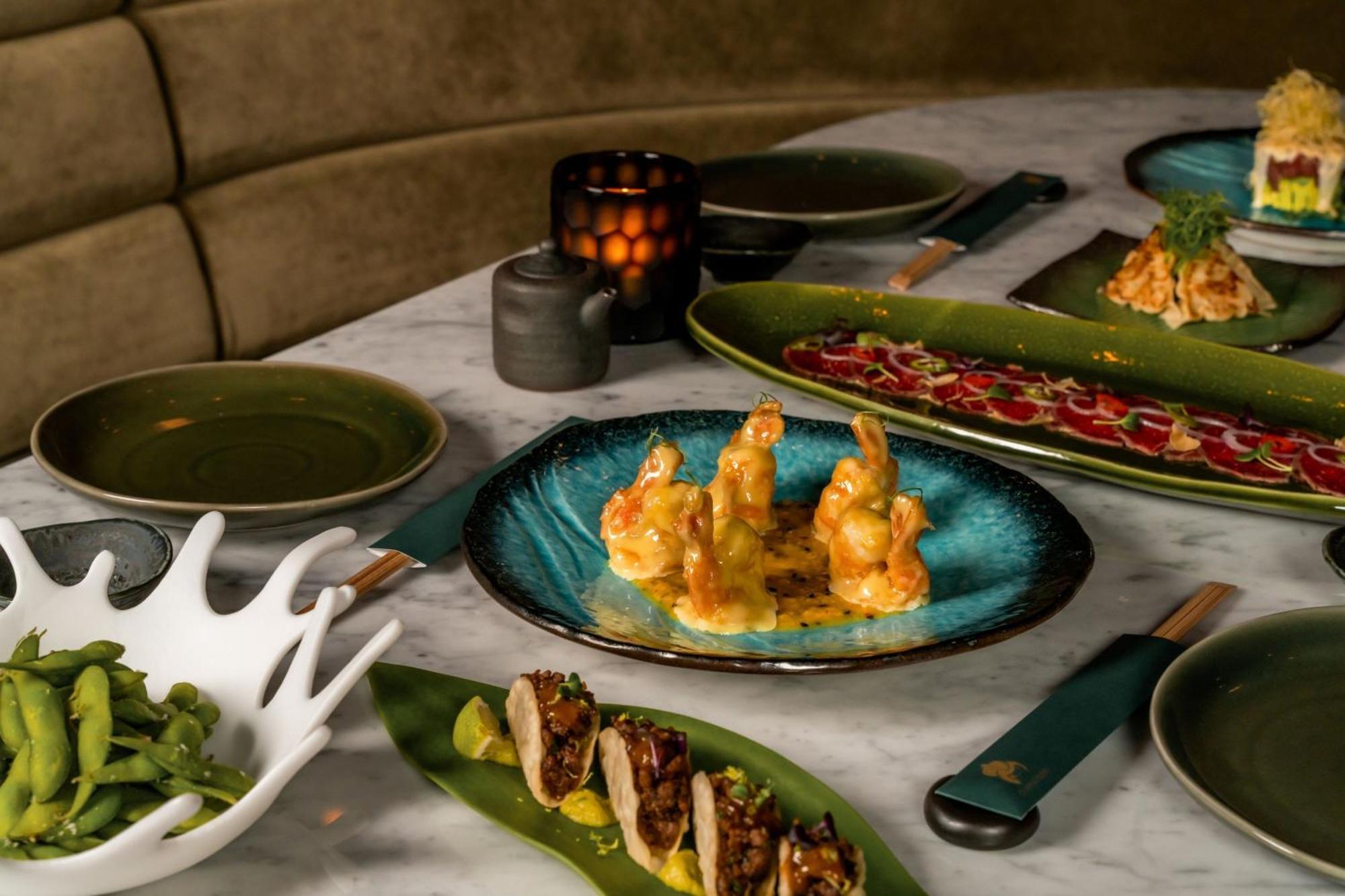 The Dubai Edition Exteriör bild A selection of dishes at the restaurant